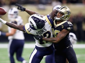 New Orleans Saints' P.J. Williams breaks up the pass intended for Los Angeles Rams' Brandin Cooks during their game on Sunday. (GETTY IMAGES)