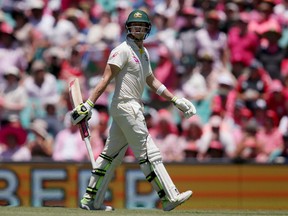 Australia's Steve Smith walks off after he was caught and bowled by England's Moeen Ali earlier this year. (THE CANADIAN PRESS)