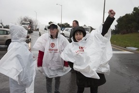 GM workers block the exit from the GM plant on Stevenson St. in Oshawa after hearing the company plans on shutting down the plant on Monday November 26, 2018. Craig Robertson/Toronto Sun