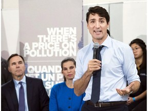 Prime Minister Justin Trudeau speaks to the media and students at Humber College regarding his government's new federally-imposed carbon tax in Toronto on Tuesday, Oct. 23. Nathan Denette/THE CANADIAN PRESS ORG XMIT: POS1810231130098109