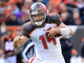 Ryan Fitzpatrick #14 of the Tampa Bay Buccaneers runs with the ball against the Cincinnati Bengals at Paul Brown Stadium on October 28, 2018 in Cincinnati, Ohio.  (Photo by Andy Lyons/Getty Images)