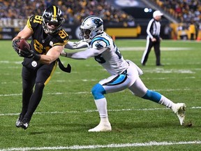 Jesse James #81 of the Pittsburgh Steelers runs into the end zone for an 8 yard touchdown reception during the third quarter in the game against the Carolina Panthers at Heinz Field on November 8, 2018 in Pittsburgh, Pennsylvania.