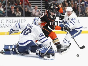 Morgan Rielly #44 and Garret Sparks #40 of the Toronto Maple Leafs defend against Ryan Kesler #17 of the Anaheim Ducks during the third period of a game at Honda Center on November 16, 2018 in Anaheim, California.  (Photo by Sean M. Haffey/Getty Images)
