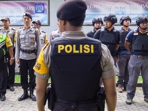 (File photo) Mobile Brigade Corps gather at Bangli Prison to provide protection for Renae Lawrence as she is released from Bangli prison on November 21, 2018 in Bangli, Bali, Indonesia.