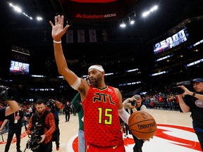 ATLANTA, GA - NOVEMBER 21:  Vince Carter #15 of the Atlanta Hawks reacts after scoring his 25,000th NBA point in the final seconds of their 124-108 loss to the Toronto Raptors at State Farm Arena on November 21, 2018 in Atlanta, Georgia.  NOTE TO USER: User expressly acknowledges and agrees that, by downloading and or using this photograph, User is consenting to the terms and conditions of the Getty Images License Agreement.  (Photo by Kevin C. Cox/Getty Images)