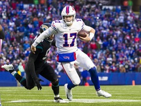 Josh Allen of the Buffalo Bills runs with the ball during the fourth quarter against the Jacksonville Jaguars at New Era Field on Nov. 25, 2018 in Orchard Park, N.Y.