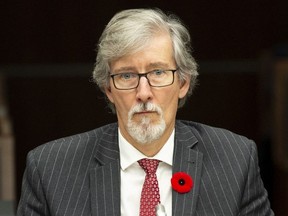 Privacy Commissioner Daniel Therrien waits to appear at the House of Commons information, privacy and ethics committee in Ottawa, Thursday November 1, 2018.