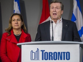 Toronto Mayor John Tory, joined by Councillor Ana Bailao, addresses media at City Hall on Oct. 24, 2018. (Ernest Doroszuk/Toronto Sun)