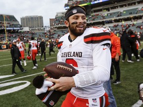 Cleveland Browns quarterback Baker Mayfield smiles after beating the Cincinnati Bengals on Sunday. (AP PHOTO)