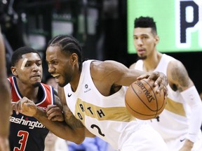 Why is Kawhi Leonard never seen on the Toronto Raptors' bench when sitting out? (VERONICA HENRI/Toronto Sun)