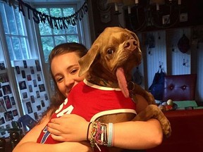 Murray the disabled dog and his owner Mackenzie Gallant who adopted him.