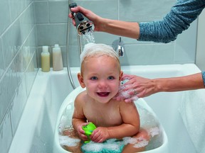 A spray-and-pause setting on the Peerless shower system makes washing squirmy bathers easier.