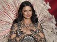 Adriana Lima gestures to the audience as she walks the runway during the 2018 Victoria's Secret Fashion Show at Pier 94 in New York on Thursday, Nov. 8, 2018.