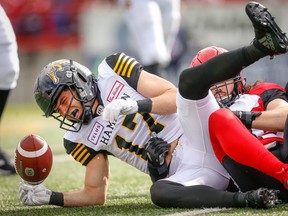 Tiger-Cats’ Luke Tasker got emotional yesterday knowing that with all the impending free agents, many of his teammates won’t be back next season.  Al Charest/Postmedia Network