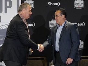 CFL commissioner 
Randy Ambrosie (left) and Oscar Perez, the CEO of Liga de Futbol Americano Profesional, shakes hands after signing a letter of intent that will see their leagues work together.  LARRY WONG/POSTMEDIA NETWORK
