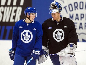 Toronto Maple Leafs forward Mitch Marner and goalie Frederik Andersen talk during practice at the MasterCard Centre in Toronto on Thursday, November 8, 2018. (Ernest Doroszuk/Toronto Sun)