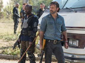 In this image released by AMC, Lennie James portrays Morgan Jones, left, and Andrew Lincoln portrays Rick Grimes in a scene from "The Walking Dead." (Gene Page/AMC via AP)
