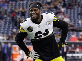 In this Dec. 25, 2017, file photo, Pittsburgh Steelers running back Le'Veon Bell warms up before an NFL game against the Houston Texans, in Houston.