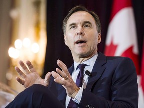 Finance Minister Bill Morneau attends a breakfast event co-hosted by the Canadian Club and the Empire Club in Toronto, on Thursday, March 1, 2018. (THE CANADIAN PRESS/Christopher Katsarov)