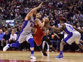 Raptors guard Fred VanVleet (23) drives between Detroit Pistons guard Jose Calderon (81) and Detroit Pistons guard Langston Galloway (9) during first-half action in Toronto on Wednesday, Nov. 14, 2018. (FRANK GUNN/THE CANADIAN PRESS)