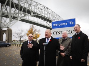 Premier Doug Ford, second from left, at the Bluewater Bridge in Sarnia on Nov. 2, 2018. (FordNation/Twitter)