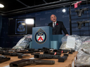 Toronto Police display handguns that had been hidden in a fuel tank and were seized as part of Project Belair.