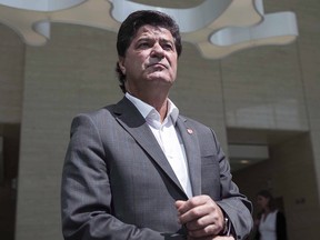 Unifor president Jerry Dias makes his way to speak to the press in Toronto on Friday, Aug. 25, 2017.