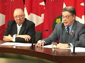 NDP MPP Paul Miller (right) is supported by PC MPP Bob Bailey as he introduces bill at Queen's Park on Wednesday November 22 2018 that would create Social Assistance Research Commission. (Toronto Sun/Antonella Artuso)