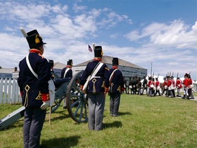 American forces occupy the fort after winning the Battle of Fort George and raising their flag during a re-enactment. (Fred Mercnik/Postmedia files)