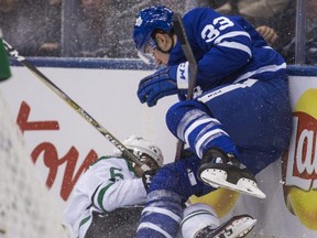 Maple Leafs’ Frederik Gauthier and Dallas Stars’ Julius Honka collide during Thursday night’s game at Scotiabank Arena.  (Ernest Doroszuk/Toronto Sun)