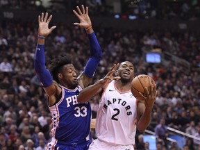 Raptors’ forward Kawhi Leonard (right) says 
he feels good and that not playing back-to-backs is simply about injury prevention. (THE CANADIAN PRESS)