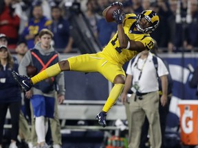 Los Angeles Rams wide receiver Robert Woods makes a catch against the Kansas City Chiefs during the first half of an NFL football game Monday, Nov. 19, 2018, in Los Angeles.