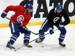 John Tavares, left, and Justin Holl during a Leafs preseason workout at the Mastercard Centre in Toronto on Monday October 1, 2018. Dave Abel/Toronto Sun