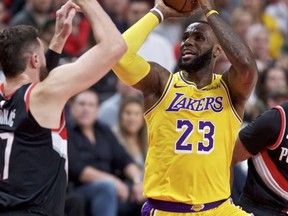 The Raptors take on LeBron James and the LA Lakers Sunday. (AP)