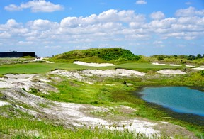 The 18th hole on Streamsong Black, where players will face their first water hazard of the day. Below, the first hole at Streamsong Red.