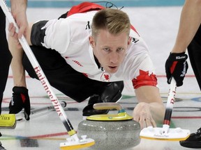 Canada's Marc Kennedy launches his stone during a men's curling match against Norway at the 2018 Winter Olympics in Gangneung, South Korea, Feb. 15, 2018.