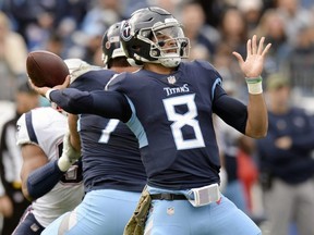 Titans quarterback Marcus Mariota throws a pass against the Patriots during NFL action in Nashville, Tenn., on Nov. 11, 2018. The Titans play the Texans, who have won seven games in a row, Monday night.