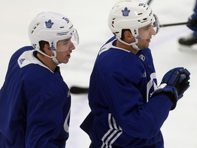 Mitch Marner jokes with John Tavares during Leafs practice at the MasterCard Centre in Toronto on Nov. 29, 2018. (DAVE ABEL/Toronto Sun)