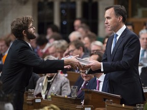 Finance Minister Bill Morneau tables the fall economic update in the House of Commons, in Ottawa on Wednesday, Nov. 21, 2018. (THE CANADIAN PRESS/Adrian Wyld)
