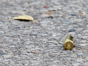 A shell casing found on the street as Toronto Police investigate the scene on Ann Arbour Rd. in the Weston/Wilson area after the city suffered it's 89th Homicide of 2018 in Toronto on Wednesday November 14, 2018. (Dave Abel/Toronto Sun/Postmedia Network)