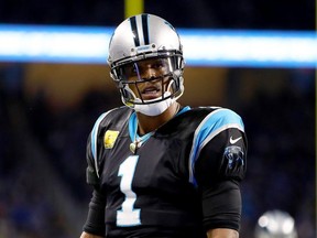 Carolina quarterback Cam Newton a Superman? Not exactly, writes Randall the Handle. (Getty Images)