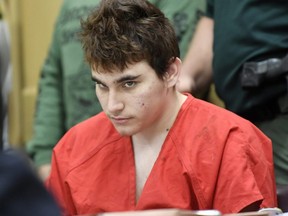 Florida school shooting suspect Nikolas Cruz, looks up while in court for a hearing in Fort Lauderdale, Fla., April 27, 2018.