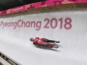 Candian luger Kim McRae, of Calgary, speeds down the track at the Olympic sliding centre prior to the start of the Pyeongchang 2018 Winter Olympic Games in South Korea, Thursday, Feb. 8, 2018.