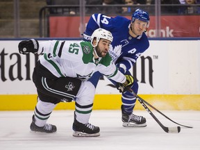 Maple Leafs' Morgan Rielly and Dallas Stars' Roman Polak give chase at the Scotiabank Arena in Toronto on Thursday, Nov. 1, 2018. (ERNEST DOROSZUK/TORONTO SUN)