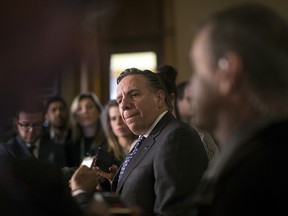 Quebec Premier Francois Legault speaks to media following his meeting with Ontario Premier Doug Ford, not shown, at Queens Park, in Toronto on Monday, Nov. 19, 2018. (THE CANADIAN PRESS/Chris Young)