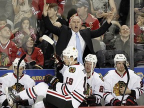 Chicago Blackhawks coach Joel Quenneville screams at the officials after a no-goal call during NHL action against the Calgary Flames in Calgary, Alta. on Tuesday January 28, 2014. (Lyle Aspinall/Calgary Sun)