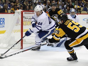 Maple Leafs defenceman Morgan Rielly had two goals against the Penguins in Pittsburgh on Saturday night. (Gene J. Puskar/The Associated Press)
