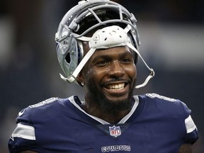 In this Nov. 23, 2017, file photo, Dallas Cowboys' Dez Bryant warms up before an NFL football game against the Los Angeles Chargers in Arlington, Texas.