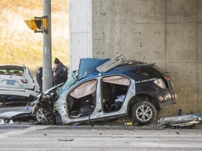 Durham Regional Police at the scene of a fatal two-car collision at the Salem Rd. underpass at the 401 in Ajax, Ont. on Monday, November 19, 2018. Ernest Doroszuk/Toronto Sun