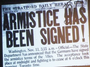 A 100-year-old clipping from the Stratford Daily Herald proclaiming the end of the First World War is shown during a Remembrance Day ceremony at Stratford Central on Friday November 9, 2018 in Stratford, Ont. (Terry Bridge/Stratford Beacon Herald)